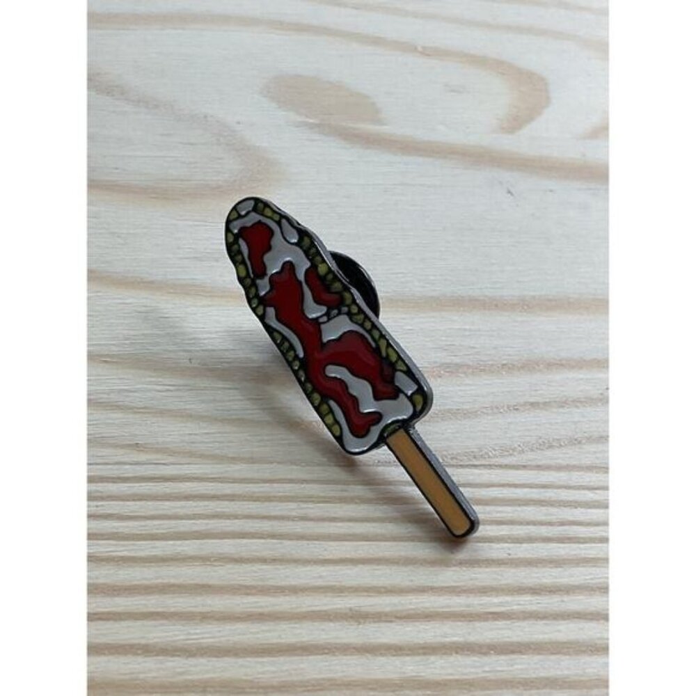 Popsicle-Shaped Enamel Pin With Red & White Swirl Design